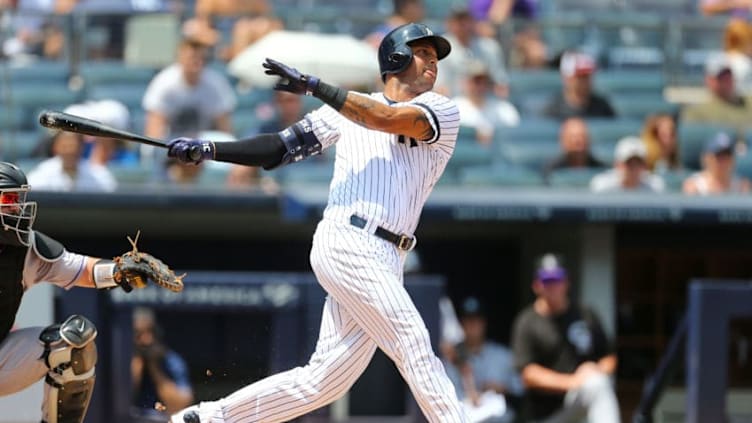 Aaron Hicks #31 of the New York Yankees hits a RBI single to right field. (Photo by Mike Stobe/Getty Images)