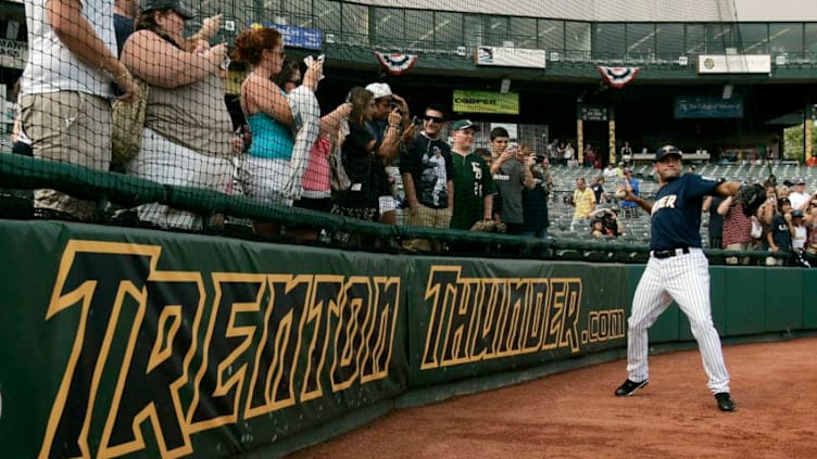 TRENTON, NJ - JULY 2: Derek Jeter #2 of the New York Yankees warms up before the start of his minor league rehab start with the Trenton Thunder in a game against the Altoona Curve on July 2, 2011 at Mercer County Waterfront Park in Trenton, New Jersey. Jeter is set to rejoin the Yankees in Cleveland on Monday in his return from a calf injury. (Photo by Rich Schultz/Getty Images)