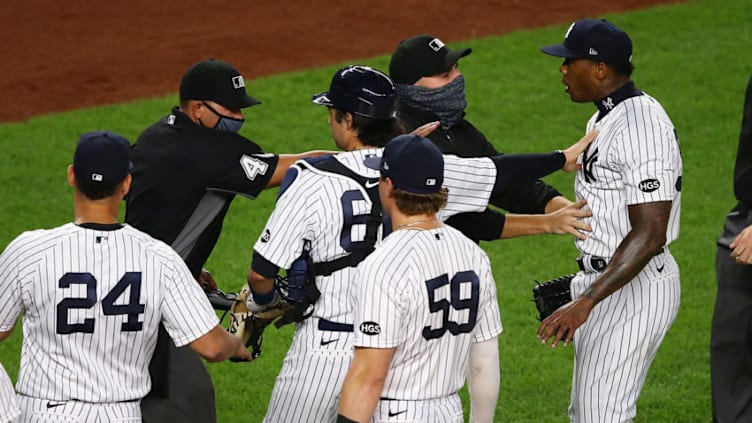 Aroldis Chapman #54 of the New York Yankees exchanges words with the Tampa Bay Rays after the final out in the ninth inning at Yankee Stadium on September 01, 2020 in New York City. (Photo by Mike Stobe/Getty Images)