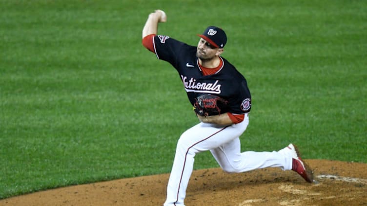 WASHINGTON, DC - SEPTEMBER 26: Daniel Hudson #44 of the Washington Nationals pitches in the seventh inning against the New York Mets during game 2 of a double header at Nationals Park on September 26, 2020 in Washington, DC. (Photo by G Fiume/Getty Images)