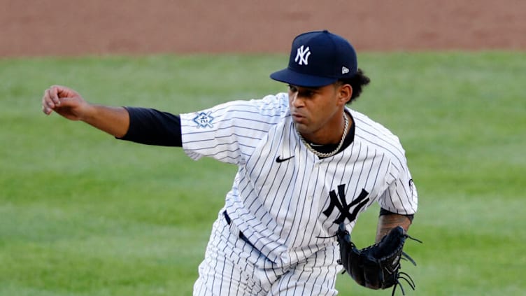 NEW YORK, NEW YORK - AUGUST 30: Deivi Garcia #83 of the New York Yankees in action against the New York Mets at Yankee Stadium on August 30, 2020 in New York City. The Yankees defeated the Mets 5-2. All players are wearing #42 in honor of Jackie Robinson Day. The day honoring Jackie Robinson, traditionally held on April 15, was rescheduled due to the COVID-19 pandemic. (Photo by Jim McIsaac/Getty Images)