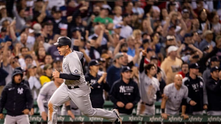 BOSTON, MA - SEPTEMBER 26: Anthony Rizzo #48 of the New York Yankees reacts as he scores on a go ahead RBI double during the eighth inning of a game against the Boston Red Sox on September 26, 2021 at Fenway Park in Boston, Massachusetts. (Photo by Billie Weiss/Boston Red Sox/Getty Images)