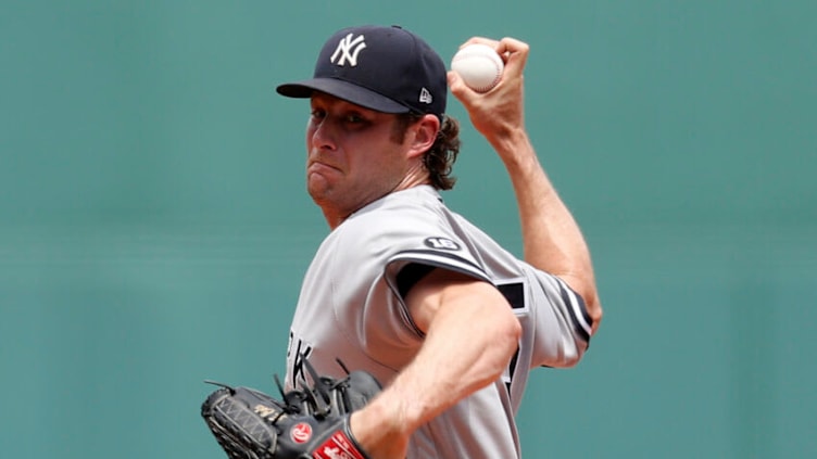 BOSTON, MASSACHUSETTS - JUNE 27: Gerrit Cole #45 of the New York Yankees throws against the Boston Red Sox during the first inning at Fenway Park on June 27, 2021 in Boston, Massachusetts. (Photo by Maddie Meyer/Getty Images)