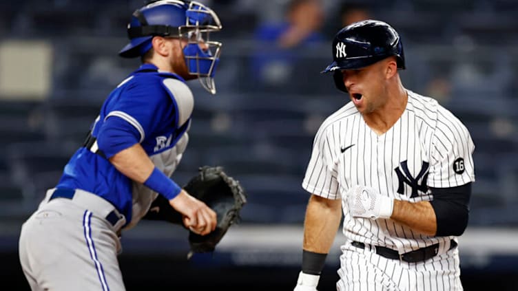 NEW YORK, NY - MAY 25: Brett Gardner #11 of the New York Yankees reacts after striking out in front of Danny Jansen #9 of the Toronto Blue Jays during the fifth inning at Yankee Stadium on May 25, 2021 in the Bronx borough of New York City. (Photo by Adam Hunger/Getty Images)