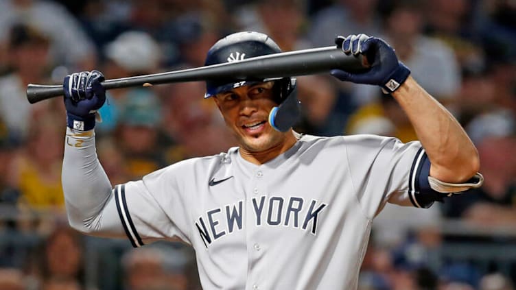 PITTSBURGH, PA - JULY 06: Giancarlo Stanton #27 of the New York Yankees reacts after a strike call against the Pittsburgh Pirates at PNC Park on July 6, 2022 in Pittsburgh, Pennsylvania. (Photo by Justin K. Aller/Getty Images)