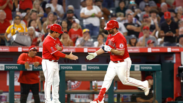 ANAHEIM, CALIFORNIA - AUGUST 29: Mike Ford #36 of the Los Angeles Angels celebrates his solo home run with third base coach Mike Gallego #86 against the New York Yankees in the fourth inning at Angel Stadium of Anaheim on August 29, 2022 in Anaheim, California. (Photo by Michael Owens/Getty Images)