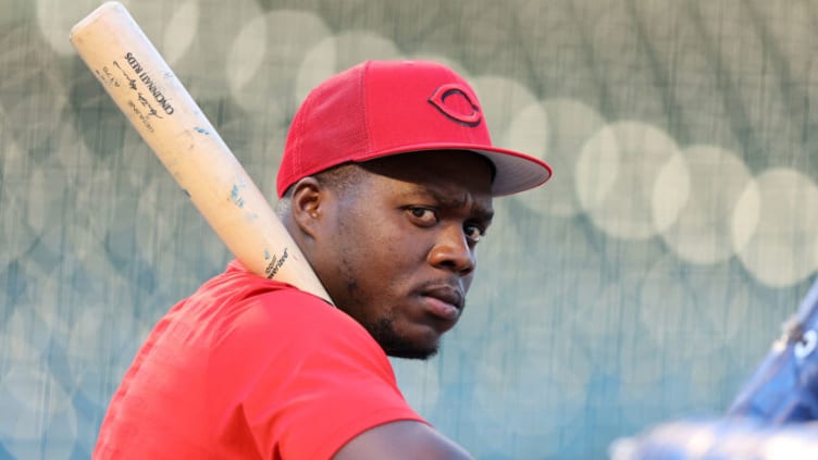 CHICAGO, ILLINOIS - SEPTEMBER 07: Aristides Aquino #44 of the Cincinnati Reds looks on prior to the game against the Cincinnati Reds at Wrigley Field on September 07, 2022 in Chicago, Illinois. (Photo by Michael Reaves/Getty Images)