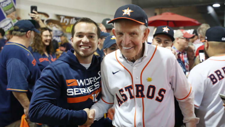 HOUSTON, TEXAS - OCTOBER 28: James Franklin McIngvale, also known as "Mattress Mack", poses with fans prior to Game One of the 2022 World Series between the Philadelphia Phillies and the Houston Astros at Minute Maid Park on October 28, 2022 in Houston, Texas. (Photo by Bob Levey/Getty Images)