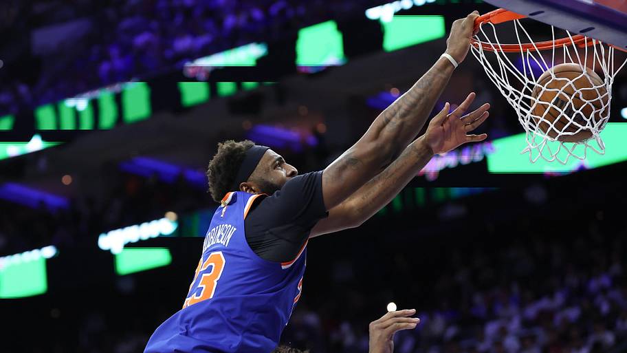 Mitchell Robinson dunks on Joel Embiid