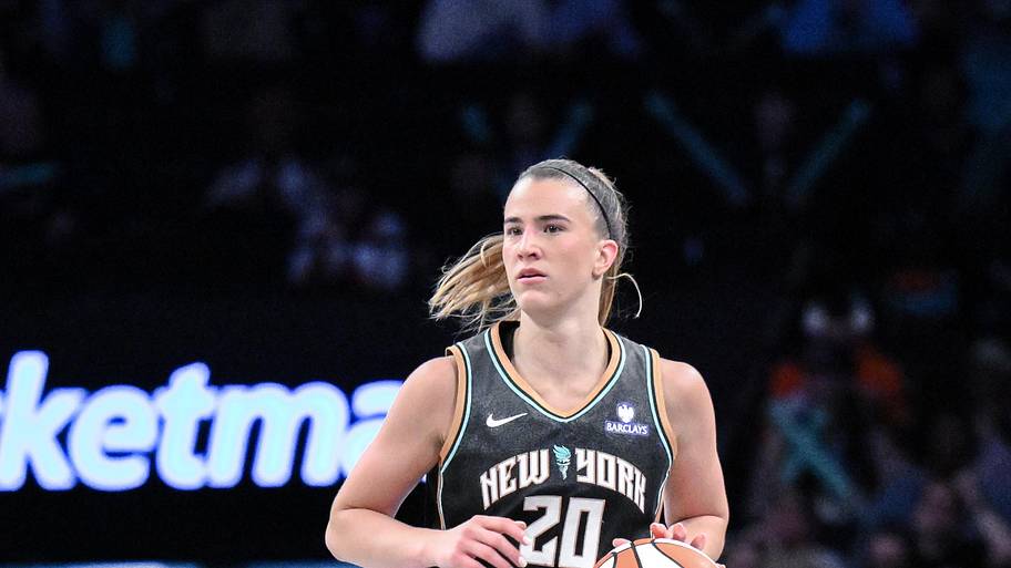 New York Liberty guard Sabrina Ionescu brings the ball up court against the Golden State Valkyries.