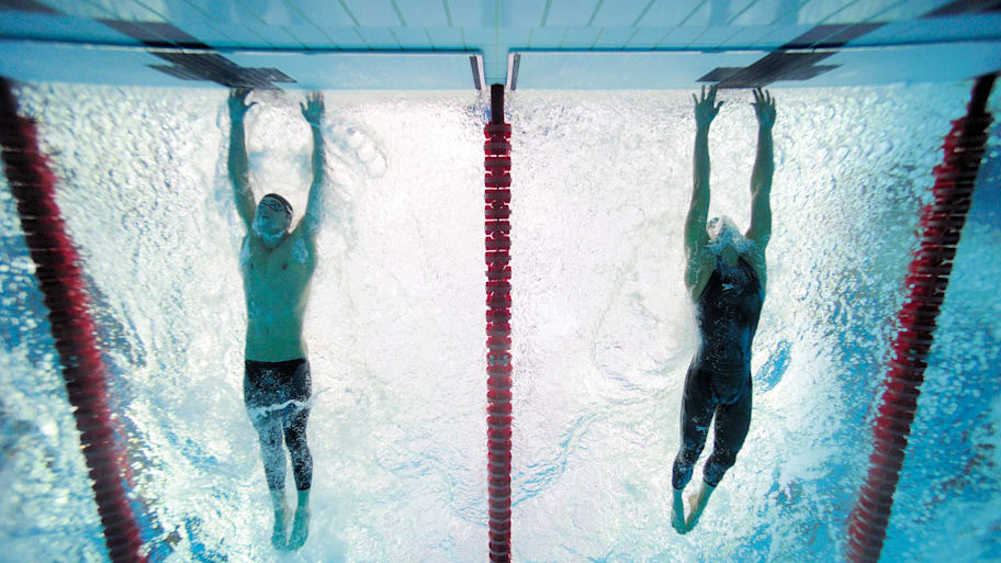 Michael Phelps won the 100m butterfly by .01 seconds at the 2008 Beijing Olympics.