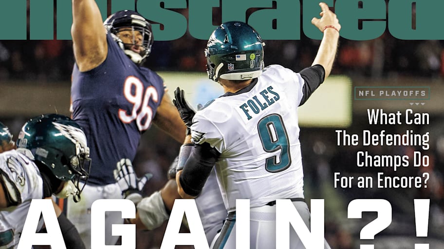 Rear view of Philadelphia Eagles QB Nick Foles (9) in action