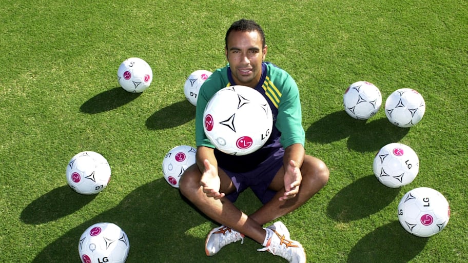 Archie Thompson with his 13 match balls after scoring 13 against American Samoa.