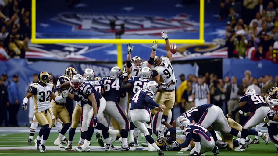 Adam Vinatieri kicks the game-winning field goal in Super Bowl XXXVI.