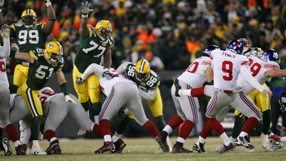 Lawrence Tynes kicks the game-winning field goal in the 2007 NFC championship game.