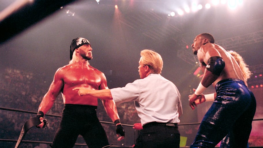 Professional Wrestling: WCW Bash at the Beach: Hulk Hogan taking off belt during match vs Karl Malone at Cox Arena.San Diego,