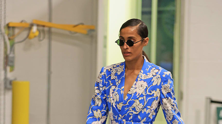Skylar Diggins of the Storm arrives at the arena for a game in a floral blue suit