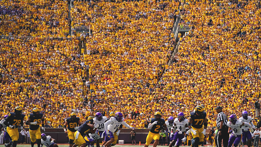 Michigan quarterback Blake Corum runs the football against East Carolina in 2023.