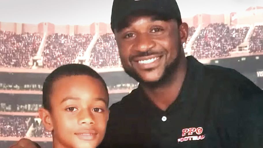 Pat Surtain Sr. with his son, a young Pat Surtain II