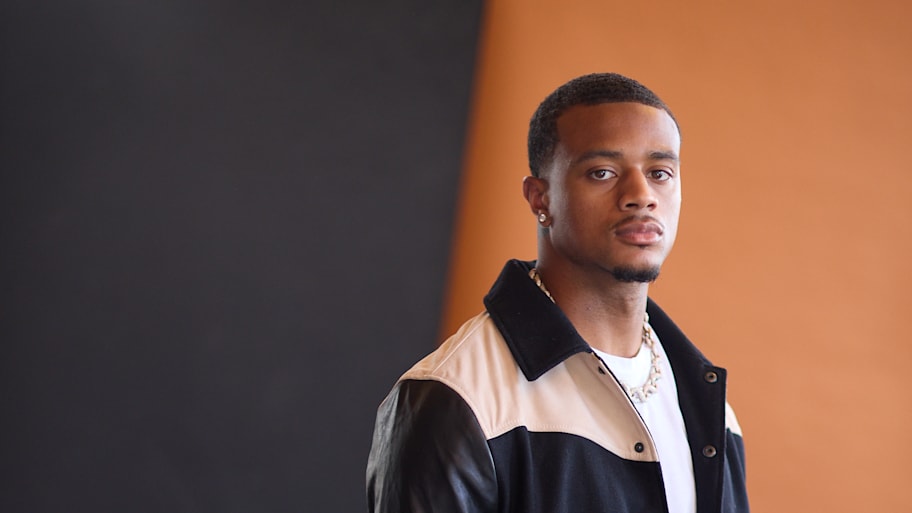 Patrick Surtain II poses in a jacket for Sports Illustrated