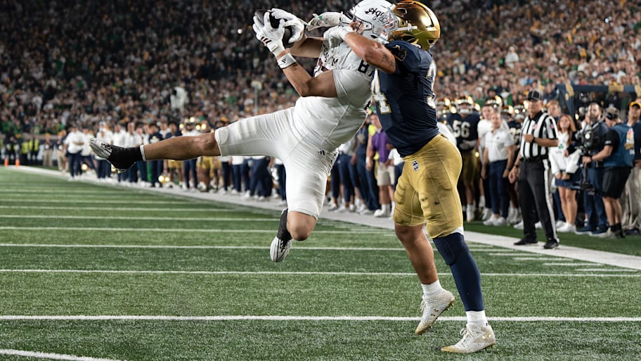 Texas A&M tight end Nate Boerkircher catches the game-winning touchdown against Notre Dame linebacker Drayk Bowen.