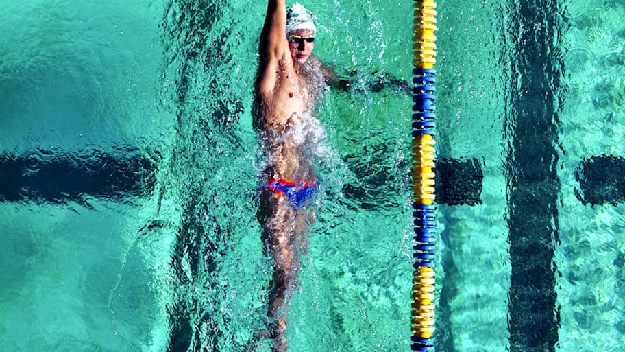 swimmer Luka Mijatovic doing a backstroke