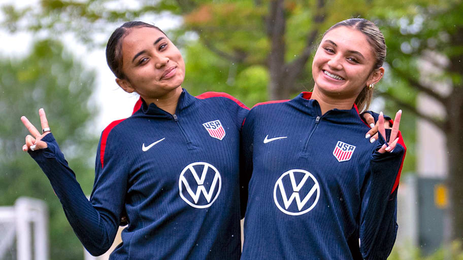 Alyssa Thompson and Gisele Thompson of the United States arrive at the field before USWNT training