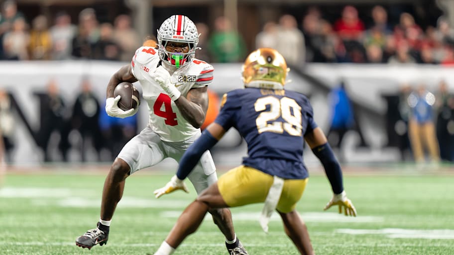 Ohio State Jeremiah Smith (4) in action, runs with the football vs Notre Dame