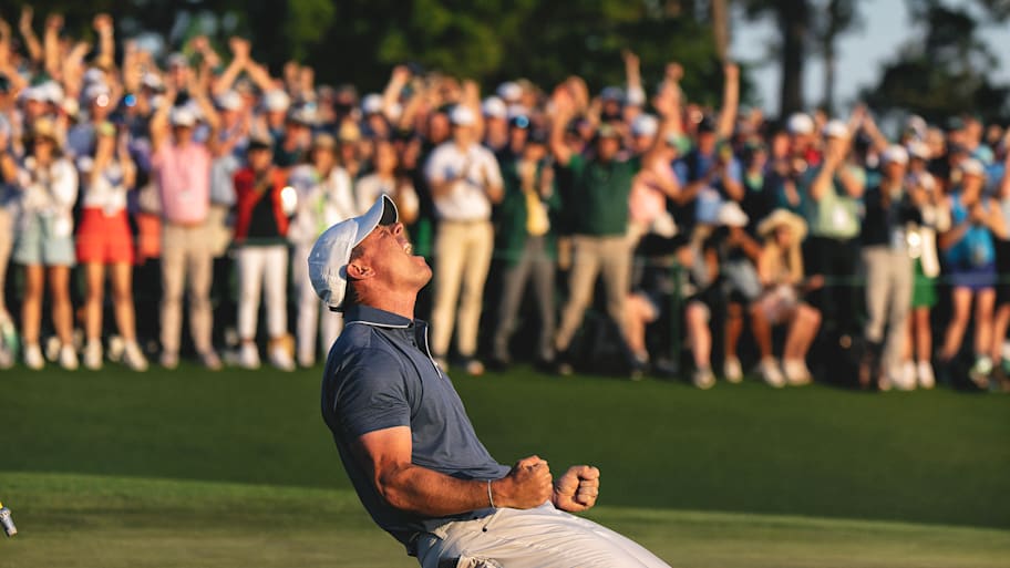 Rory McIlroy celebrates winning the Masters