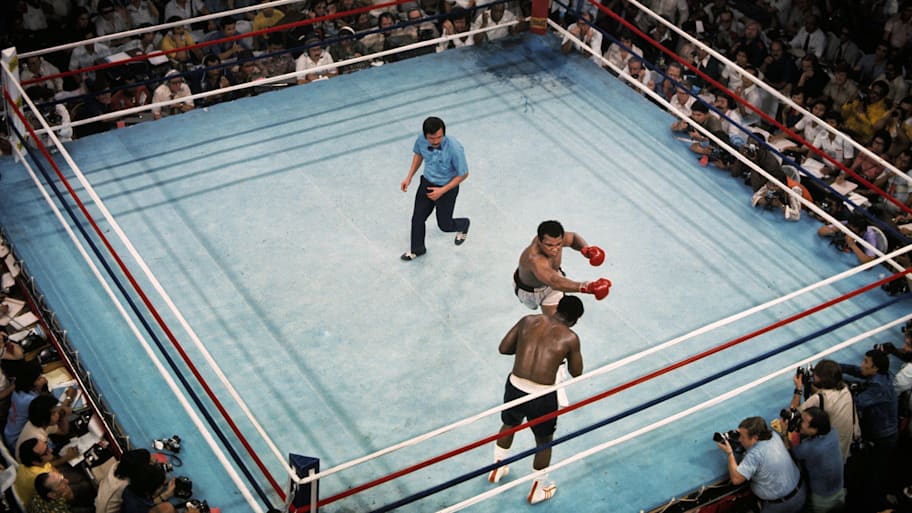 Muhammad Ali, Joe Frazier, referee Carlos Padilla