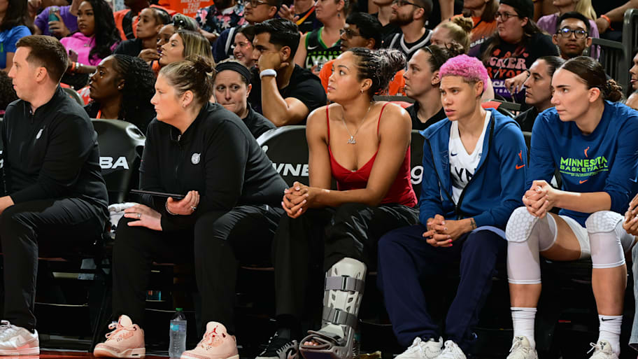 Napheesa Collier sits on the Lynx bench during Game 4 of the WNBA semifinals.