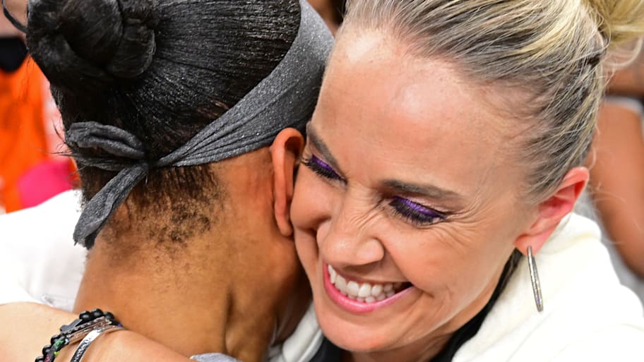 Aces coach Becky Hammon hugs A'ja Wilson