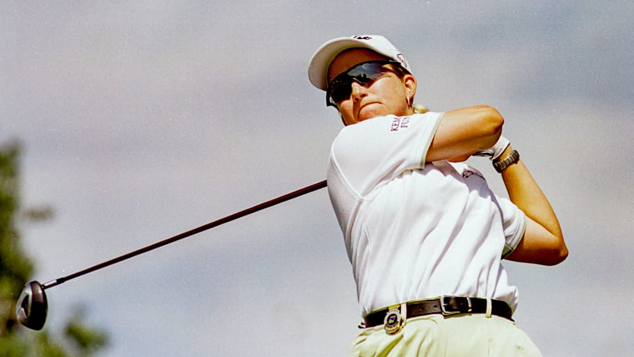 Karrie Webb follows through on a swing with her driver