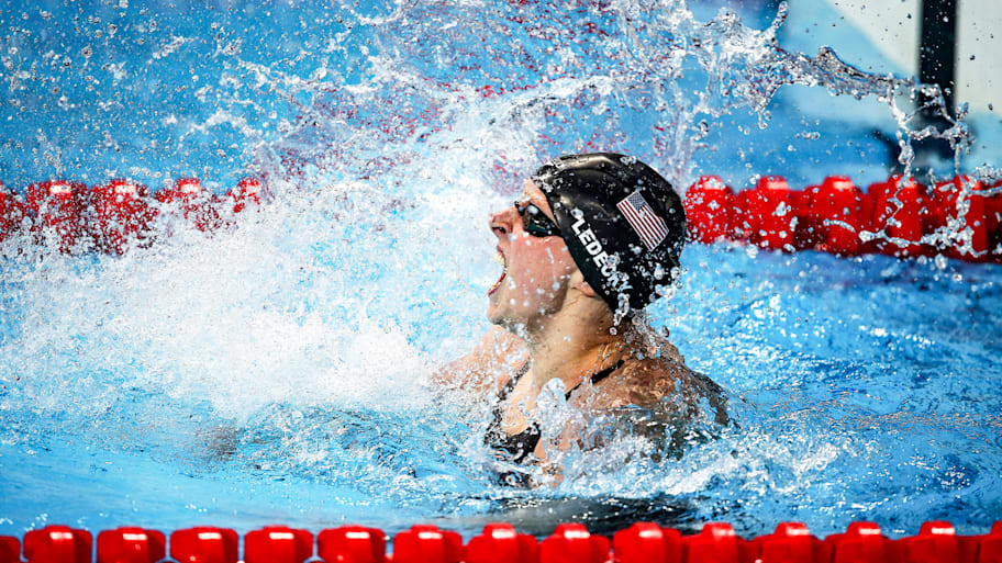 Katie Ledecky celebrates in the water at the 2015 World Aquatics Championships