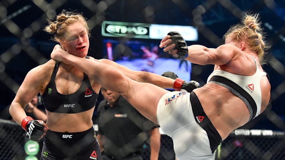 Holly Holm lands a kick to the neck to knock out Ronda Rousey