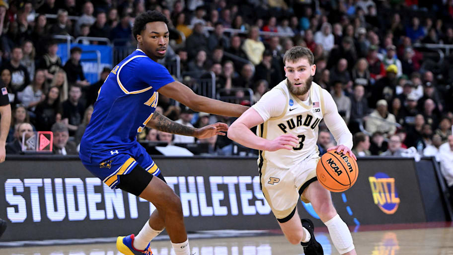 Purdue guard Braden Smith drives against McNeese State Cowboys forward Joe Charles.