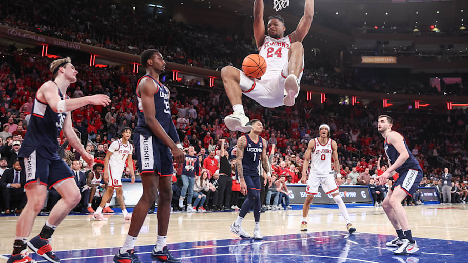 St. John's forward Zuby Ejiofor dunks against Connecticut.