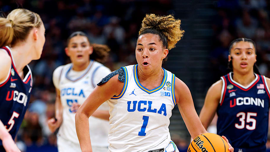 UCLA Kiki Rice (1) in action, dribbles vs UConn in Final Four