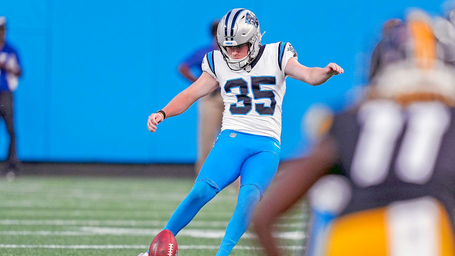 Panthers kicker Ryan Fitzgerald kicks off.