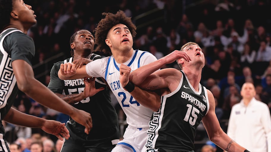Kentucky center Malachi Moreno and Michigan State center Carson Cooper battle for position during Tuesday’s game.