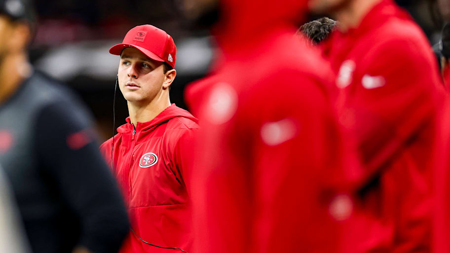 Brock Purdy on the sideline, not in uniform.