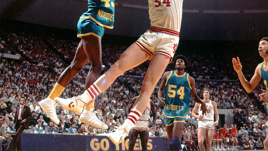 Indiana's Kent Benson shoots over Marquette's Earl Tatum on March 21, 1976.
