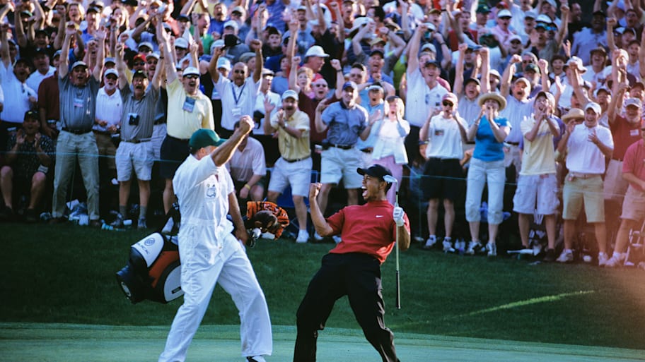 Tiger Woods and Steve Williams celebrate chip-in at 2005 Masters.