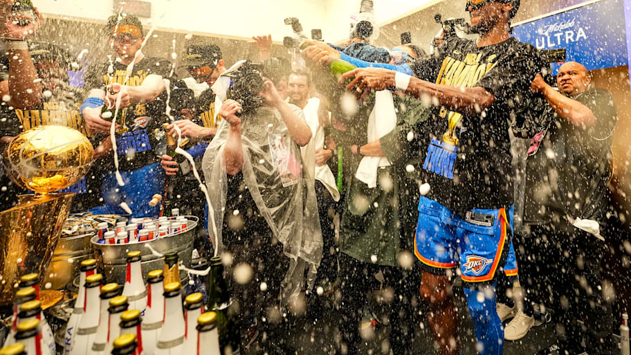 Shai Gilgeous-Alexander of the Oklahoma City Thunder celebrates in the locker room after winning the 2025 NBA Finals