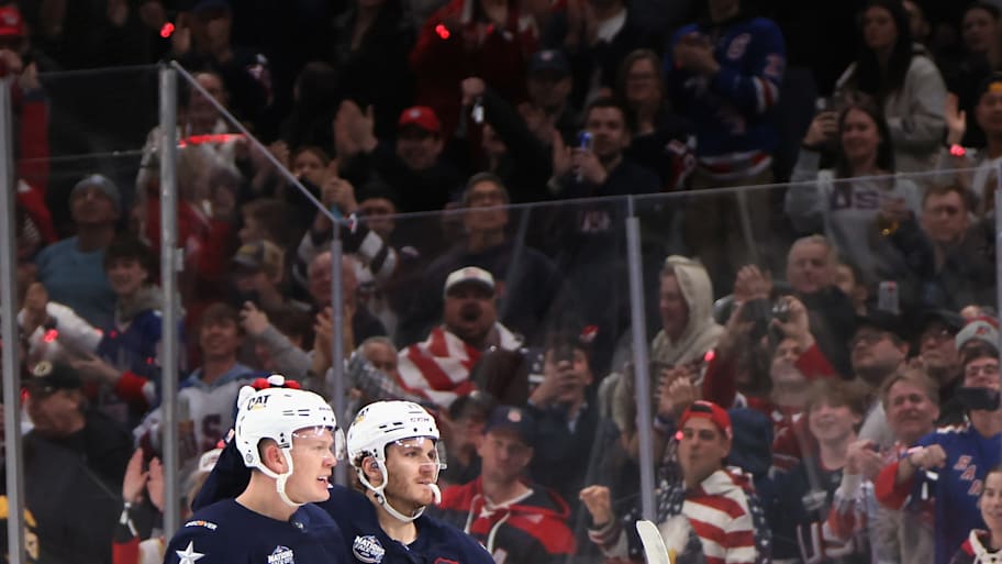 Brady Tkachuk celebrates his goal against Canada in the 4 Nations Face-Off with brother Matthew Tkachuk. 