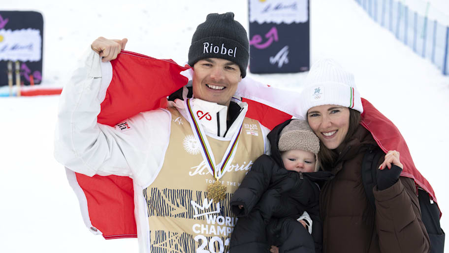 Mikaël Kingsbury with his wife and baby.