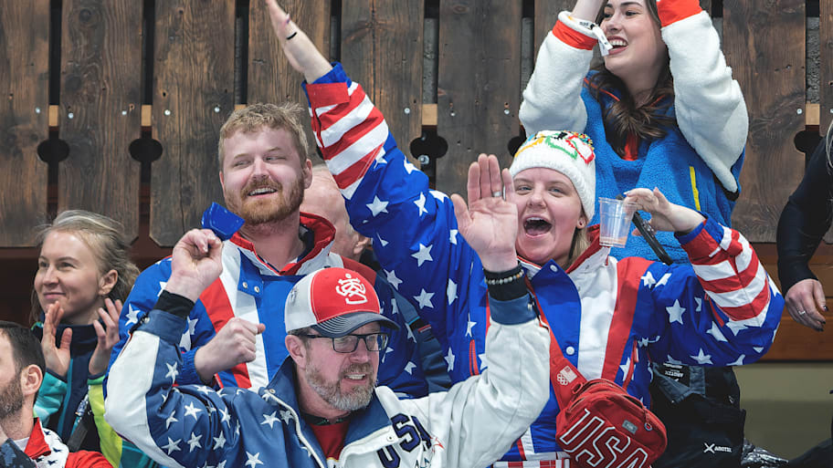 American fans celebrate during curling mixed doubles. 