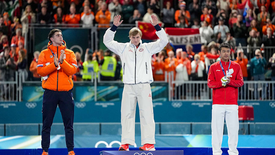 The men’s speedskating 1,000-meter podium.