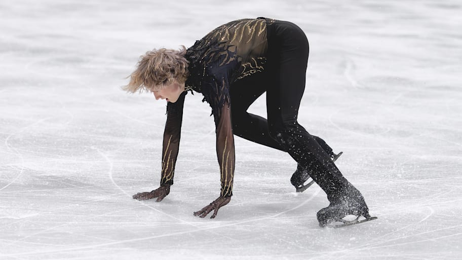 Ilia Malinin getting up from a fall