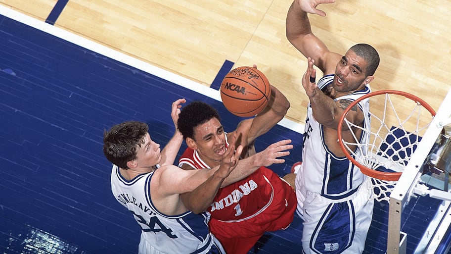 Indiana’s Jared Jeffries shoots against Duke’s Mike Dunleavy (34) and Carlos Boozer (4) in the 2002 Sweet 16.